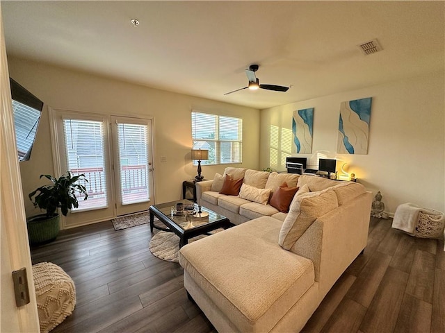544 Magnolia Cir, Palmetto, GA 30268 - living area featuring dark wood-type flooring and a ceiling fan