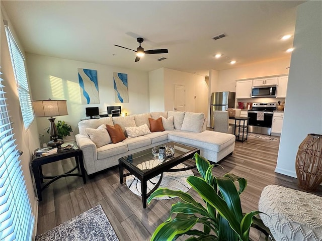 544 Magnolia Cir, Palmetto, GA 30268 - living room with dark wood-style flooring, ceiling fan, and recessed lighting