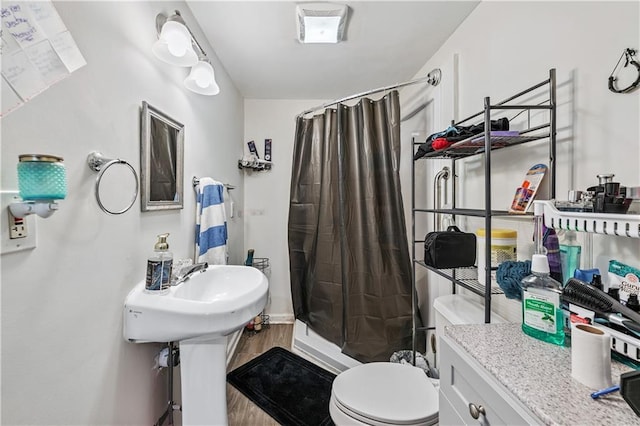 2012 Arbor Springs Way, Buford, GA 30519 - bathroom featuring a shower stall and wood finished floors