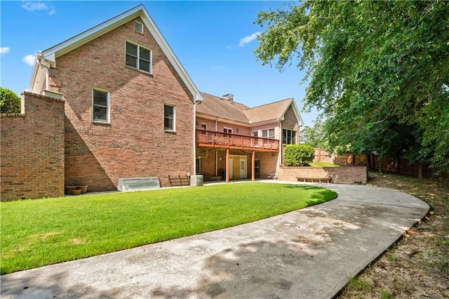 2012 Arbor Springs Way, Buford, GA 30519 - back of house featuring a patio area, brick siding, and a deck