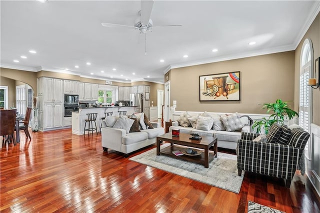 2012 Arbor Springs Way, Buford, GA 30519 - living room with ornamental molding, ceiling fan, arched walkways, recessed lighting, and wood finished floors