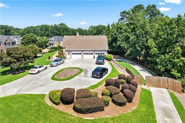 2012 Arbor Springs Way, Buford, GA 30519 - view of front of house featuring a garage, a chimney, and curved driveway