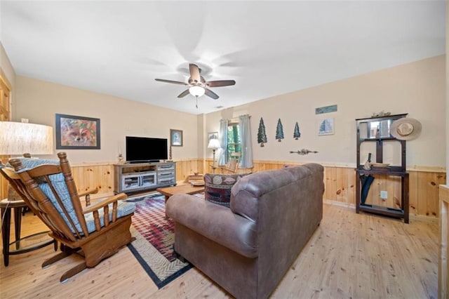 100 Julep Cir, Ellijay, GA 30540 - living area featuring wainscoting, light wood-style floors, a ceiling fan, and wooden walls