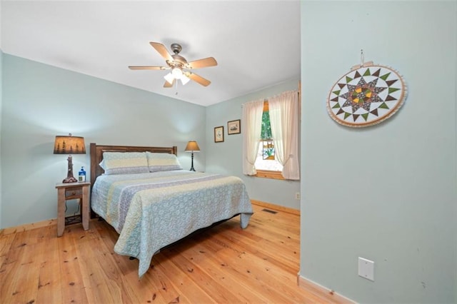 100 Julep Cir, Ellijay, GA 30540 - bedroom featuring light wood-type flooring and a ceiling fan