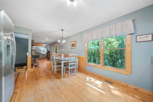 100 Julep Cir, Ellijay, GA 30540 - dining area with light wood finished floors and a wainscoted wall
