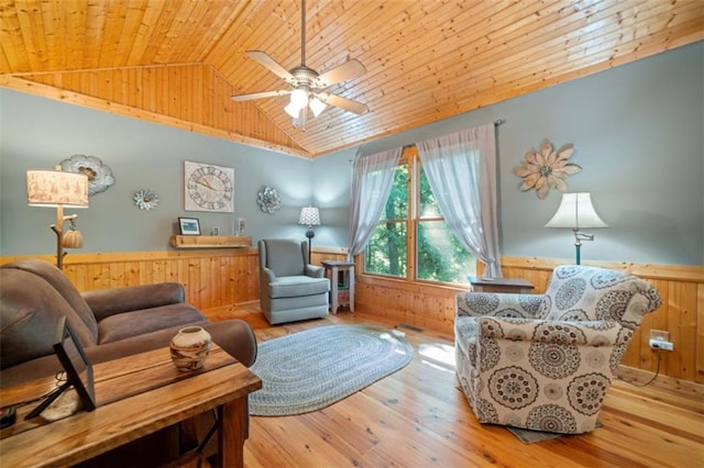 100 Julep Cir, Ellijay, GA 30540 - living area with wood ceiling, vaulted ceiling, a wainscoted wall, wood walls, and ceiling fan