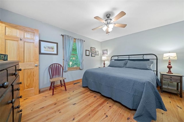 100 Julep Cir, Ellijay, GA 30540 - bedroom with light wood finished floors and a ceiling fan