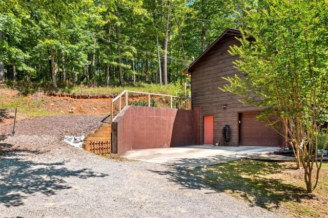 100 Julep Cir, Ellijay, GA 30540 - view of home's exterior with concrete driveway and a garage