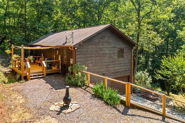 100 Julep Cir, Ellijay, GA 30540 - view of front of home with a deck and a view of trees