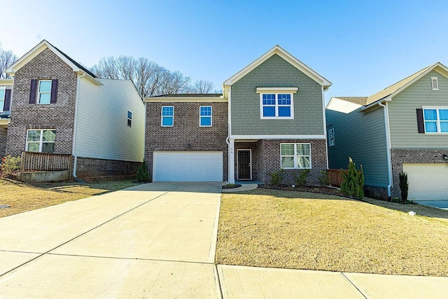 view of front of house featuring a front yard, brick siding, and driveway