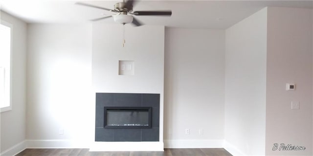 1071 Crest Mill Dr, Marietta, GA 30008 - unfurnished living room featuring ceiling fan, wood finished floors, and a fireplace