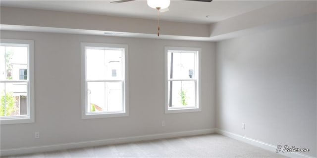 1071 Crest Mill Dr, Marietta, GA 30008 - empty room featuring plenty of natural light, light colored carpet, and ceiling fan