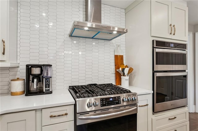 2721 Old Concord Rd SE, Smyrna, GA 30082 - kitchen featuring stainless steel appliances, wall chimney exhaust hood, backsplash, and light countertops