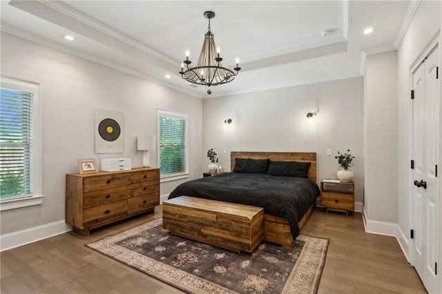 2721 Old Concord Rd SE, Smyrna, GA 30082 - bedroom with a chandelier, wood finished floors, crown molding, recessed lighting, and baseboards