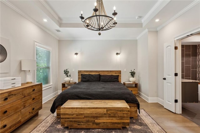 2721 Old Concord Rd SE, Smyrna, GA 30082 - bedroom featuring wood finished floors, a chandelier, crown molding, baseboards, and a raised ceiling