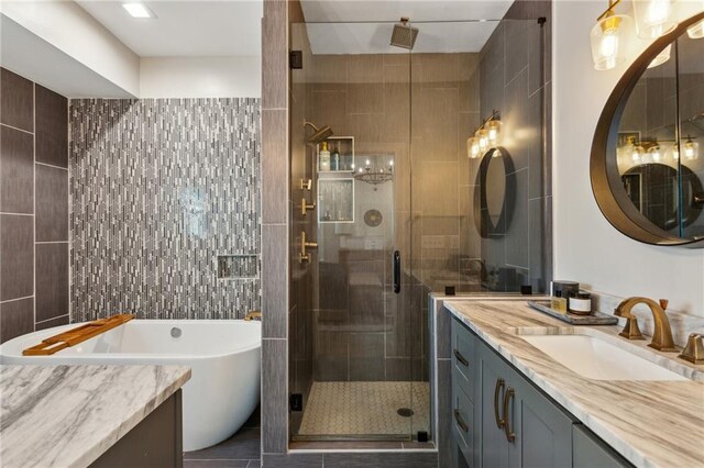 2721 Old Concord Rd SE, Smyrna, GA 30082 - full bath featuring a shower stall, vanity, tile walls, a soaking tub, and tile patterned floors