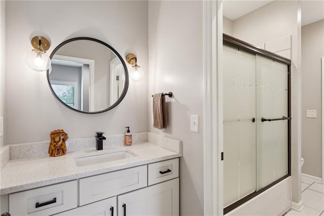 2721 Old Concord Rd SE, Smyrna, GA 30082 - bathroom featuring vanity, toilet, and enclosed tub / shower combo