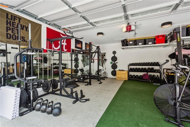 2721 Old Concord Rd SE, Smyrna, GA 30082 - exercise room featuring carpet floors and a garage
