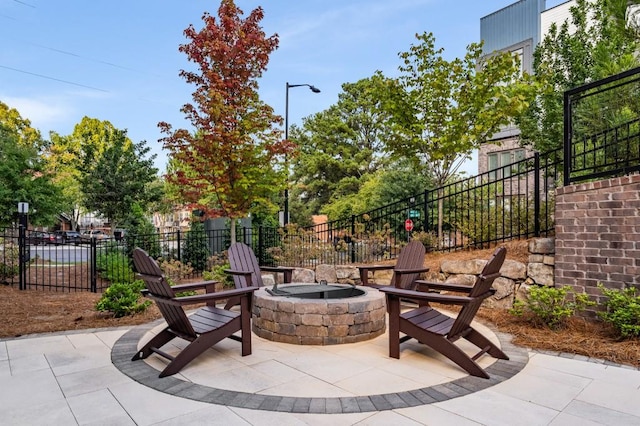 view of patio / terrace with a fire pit