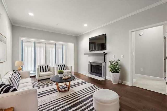 2865 Lenox Rd NE Unit 410, Atlanta, GA 30324 - living room with crown molding, baseboards, a fireplace with flush hearth, and wood finished floors