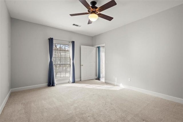 2865 Lenox Rd NE Unit 410, Atlanta, GA 30324 - carpeted spare room featuring baseboards, visible vents, and ceiling fan