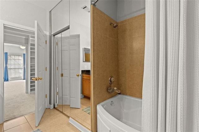 2865 Lenox Rd NE Unit 410, Atlanta, GA 30324 - full bath featuring tile patterned flooring, visible vents, and shower / bath combo