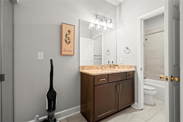 2865 Lenox Rd NE Unit 410, Atlanta, GA 30324 - bathroom featuring vanity, tile patterned flooring, toilet, baseboards, and shower / bathing tub combination