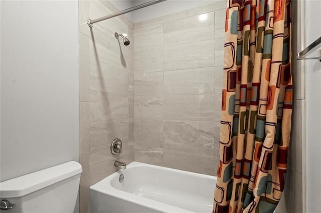 2865 Lenox Rd NE Unit 410, Atlanta, GA 30324 - bathroom with toilet and shower / tub combo with curtain