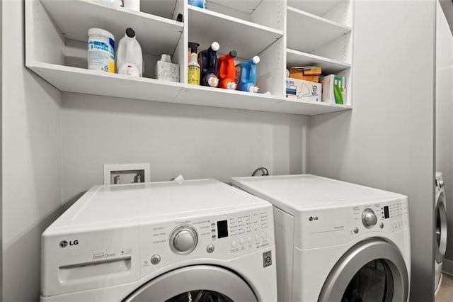 2865 Lenox Rd NE Unit 410, Atlanta, GA 30324 - laundry room with laundry area and independent washer and dryer