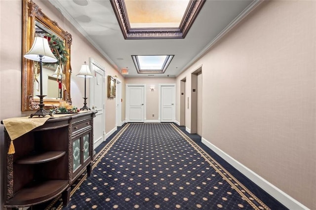2865 Lenox Rd NE Unit 410, Atlanta, GA 30324 - hallway with crown molding, baseboards, dark carpet, and elevator