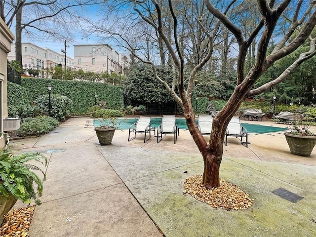 2865 Lenox Rd NE Unit 410, Atlanta, GA 30324 - view of patio with fence and a fenced in pool