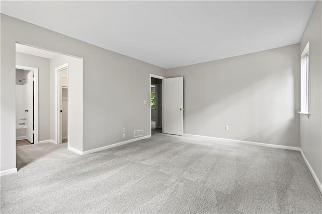 9438 Cedar Creek Pl, Douglasville, GA 30135 - carpeted spare room featuring baseboards and visible vents