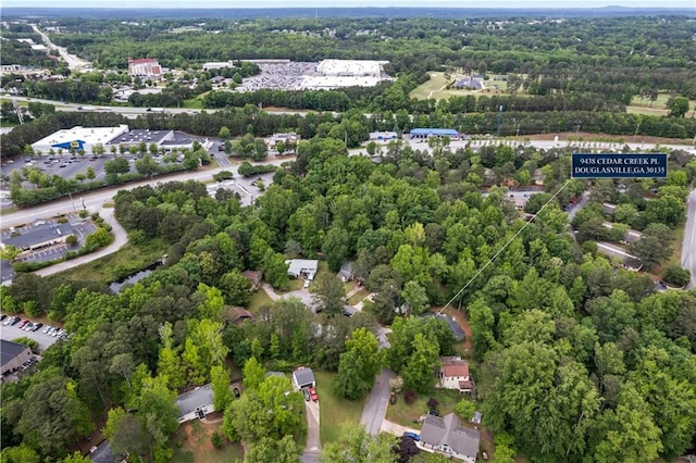 9438 Cedar Creek Pl, Douglasville, GA 30135 - bird's eye view featuring a wooded view