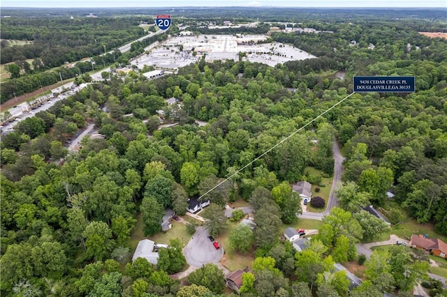 9438 Cedar Creek Pl, Douglasville, GA 30135 - aerial view featuring a view of trees