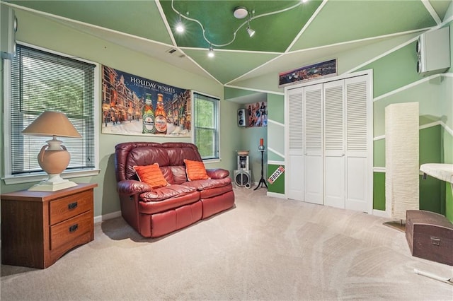 2030 Spring End Ct, Lawrenceville, GA 30044 - living area featuring carpet, vaulted ceiling, and baseboards