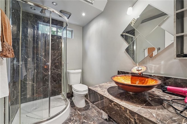 2030 Spring End Ct, Lawrenceville, GA 30044 - full bath featuring marble tiled floors, toilet, a marble finish shower, recessed lighting, and vanity