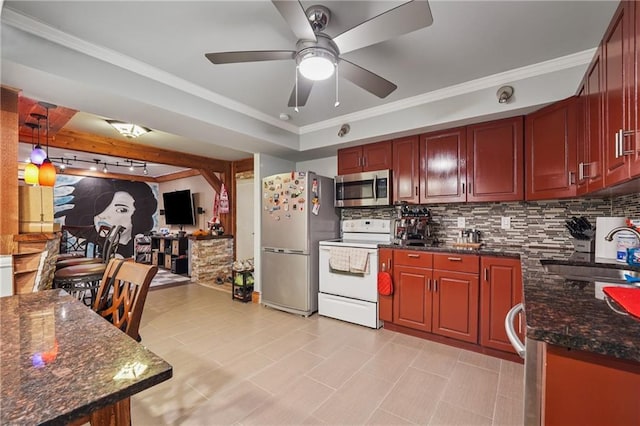 2030 Spring End Ct, Lawrenceville, GA 30044 - kitchen with appliances with stainless steel finishes, a sink, decorative backsplash, dark brown cabinets, and crown molding