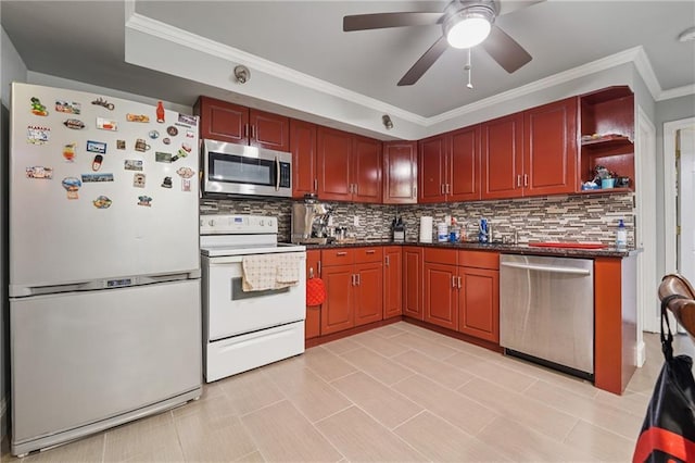 2030 Spring End Ct, Lawrenceville, GA 30044 - kitchen featuring stainless steel appliances, dark countertops, decorative backsplash, crown molding, and a ceiling fan