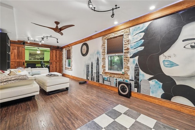 2030 Spring End Ct, Lawrenceville, GA 30044 - living room with rail lighting, wood finished floors, and ceiling fan