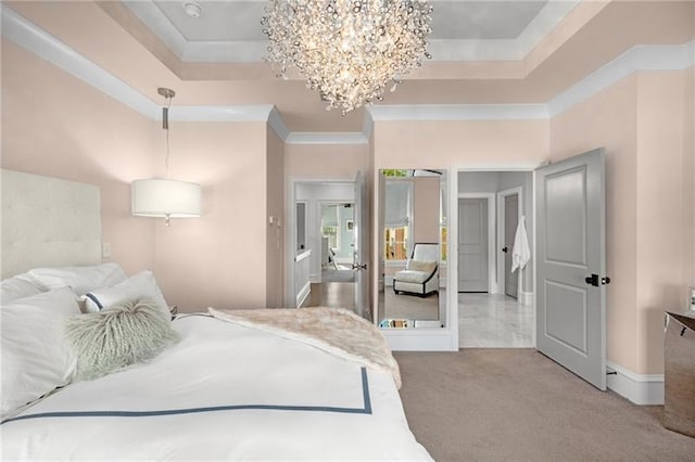 bedroom featuring a chandelier, crown molding, carpet floors, a raised ceiling, and baseboards