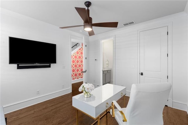 home office featuring wood finished floors, ceiling fan, and baseboards