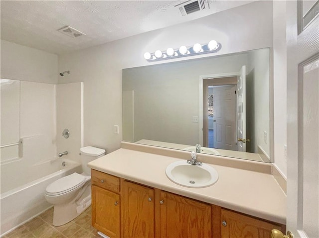 full bathroom with a textured ceiling, vanity, toilet, and shower / bathtub combination