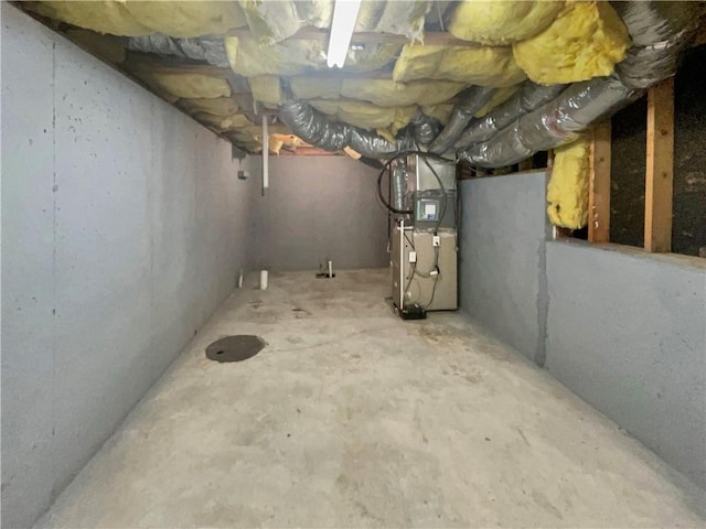 basement featuring heating unit