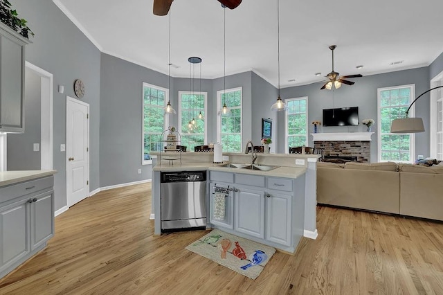 5581 River Valley Way, Flowery Branch, GA 30542 - kitchen with dishwasher, ceiling fan, a sink, light wood-style flooring, and crown molding
