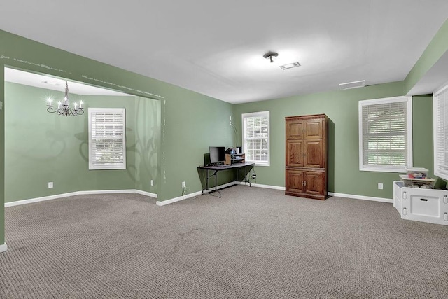 5581 River Valley Way, Flowery Branch, GA 30542 - carpeted empty room with a chandelier, a desk, and baseboards
