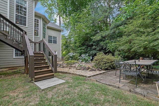 5581 River Valley Way, Flowery Branch, GA 30542 - view of yard featuring a patio area, stairway, and outdoor dining space