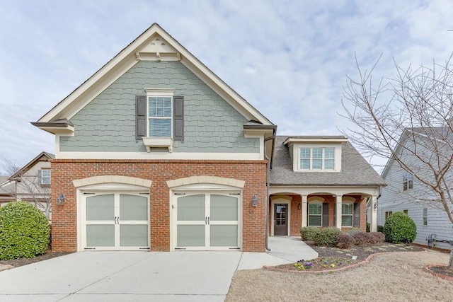 view of front facade featuring a garage and covered porch