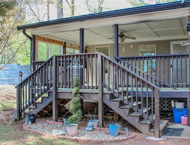 wooden terrace featuring stairs