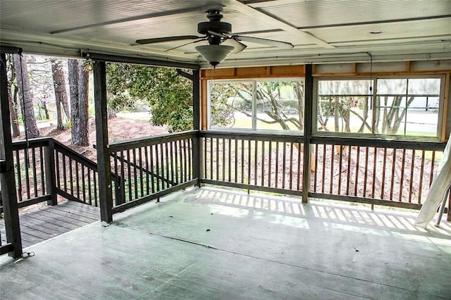 exterior space with a ceiling fan