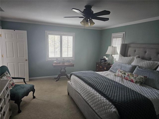 bedroom with light carpet, a ceiling fan, baseboards, and crown molding